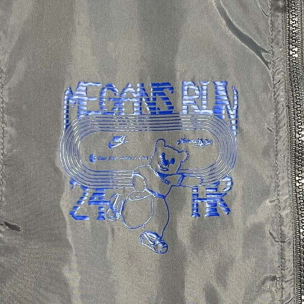 Vintage 1990s Nike Megans Run Windbreaker Jacket L