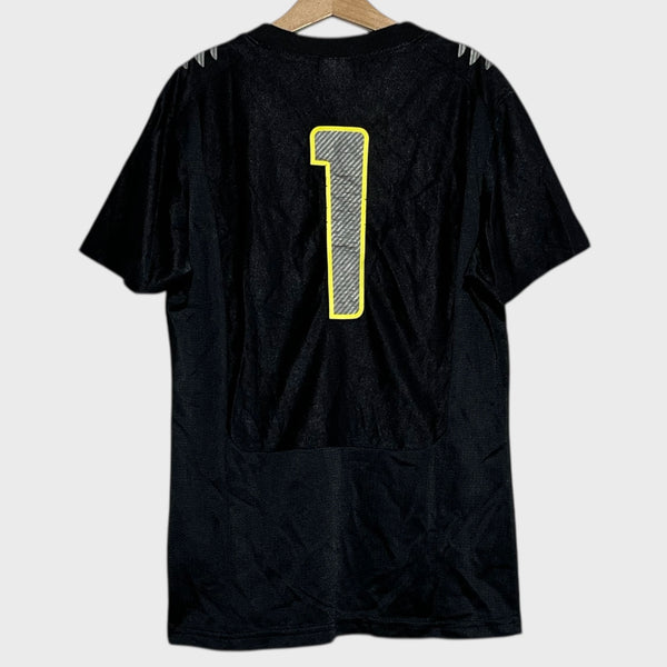 Back of a black football jersey with yellow number 1 on a white background