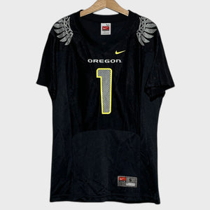 Black football jersey with 'Oregon' and number '1' on a white background