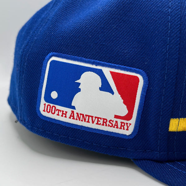 Blue cap with MLB 100th Anniversary logo on a white background