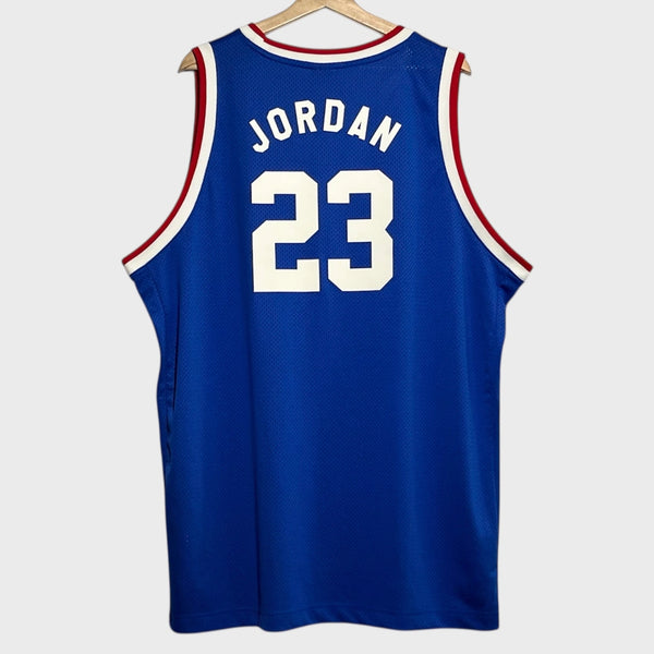 Blue basketball jersey with 'Jordan' and number '23' on a white background