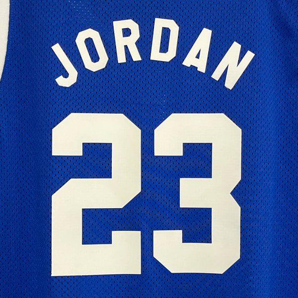 Blue basketball jersey with 'Jordan' and number '23' on a blue background