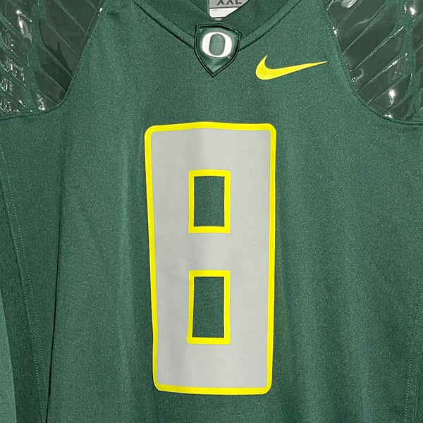 Green football jersey with number 8 and Nike logo