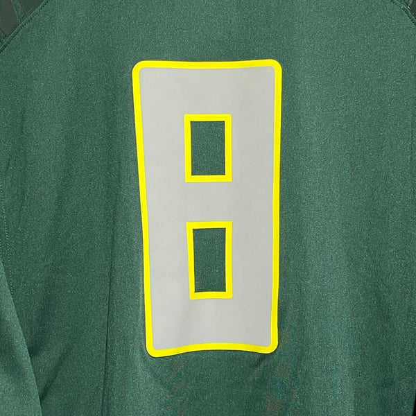 Green football jersey with number 8 on a dark green background
