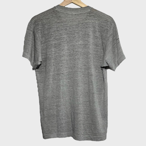 Gray t-shirt on a hanger against a white background