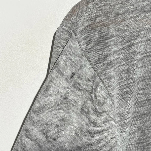 Close-up of a gray fabric texture on a light background