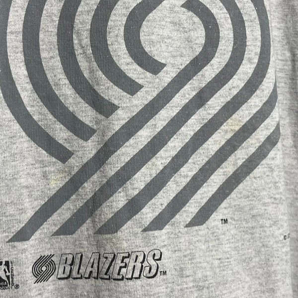 Gray baseball jersey with black pinwheel design and 'Blazers' branding.