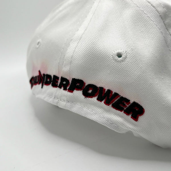 White cap with 'Thunder Power' embroidered on a light gray background