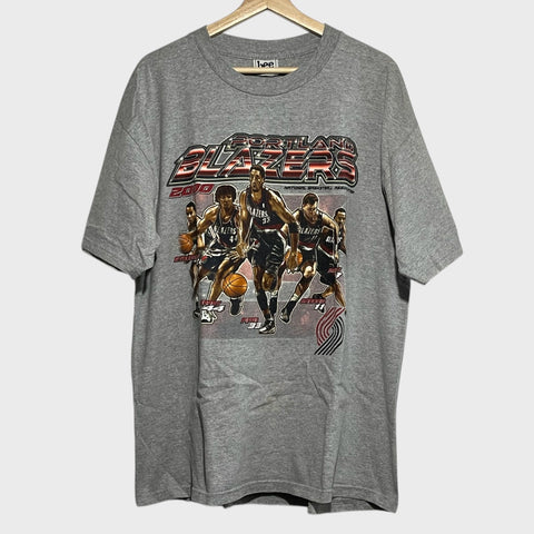 Gray t-shirt with Portland Blazers graphic on a white background