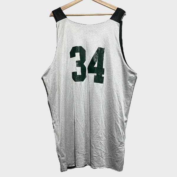 Back of a white basketball jersey with number 34 on a hanger against a white background